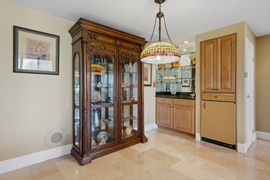 Serene Lakefront Views through 9-ft walls of windows. Lots of on Desert Island Golf and Country Club in California - for sale on GolfHomes.com, golf home, golf lot