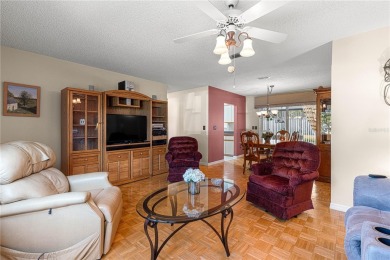 PRICE IMPROVEMENT ON THIS UNIQUE MAPLE MODEL, being offered as on The Links of Spruce Creek in Florida - for sale on GolfHomes.com, golf home, golf lot