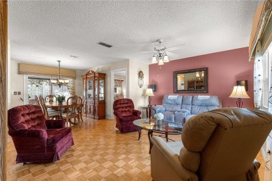 PRICE IMPROVEMENT ON THIS UNIQUE MAPLE MODEL, being offered as on The Links of Spruce Creek in Florida - for sale on GolfHomes.com, golf home, golf lot