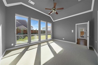 Welcome to resort-style living in The Tribute, a premier on The Tribute At the Colony in Texas - for sale on GolfHomes.com, golf home, golf lot