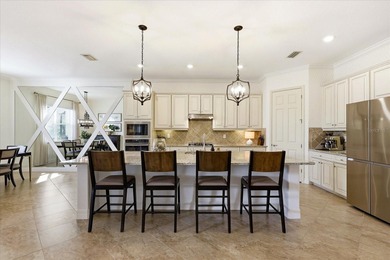 Welcome to 12007 PERENNIAL PLACE! Set within the prestigious on Esplanade Golf and Country at Lakewood Ranch in Florida - for sale on GolfHomes.com, golf home, golf lot