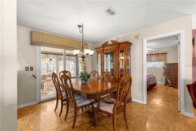 PRICE IMPROVEMENT ON THIS UNIQUE MAPLE MODEL, being offered as on The Links of Spruce Creek in Florida - for sale on GolfHomes.com, golf home, golf lot