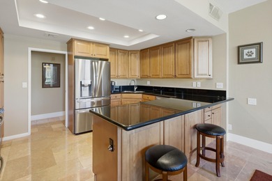 Serene Lakefront Views through 9-ft walls of windows. Lots of on Desert Island Golf and Country Club in California - for sale on GolfHomes.com, golf home, golf lot