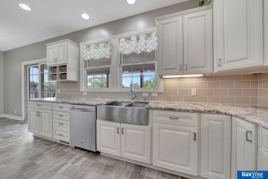 Nestled among the scenic Hi-Mark golf couse, this stunning on Pine Lake Golf and Tennis Club in Nebraska - for sale on GolfHomes.com, golf home, golf lot