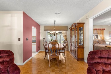 PRICE IMPROVEMENT ON THIS UNIQUE MAPLE MODEL, being offered as on The Links of Spruce Creek in Florida - for sale on GolfHomes.com, golf home, golf lot
