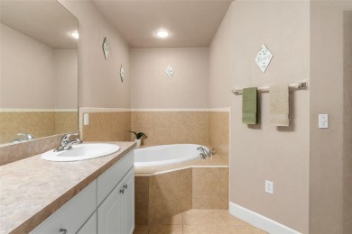 Welcome to the only two-story home in the gated Creekside Villas on Turkey Creek Golf and Country Club in Florida - for sale on GolfHomes.com, golf home, golf lot