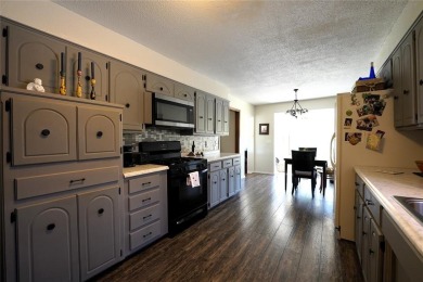 Incredible opportunity in a prime location! Nestled in one of on Golf Club At Surrey Hills in Oklahoma - for sale on GolfHomes.com, golf home, golf lot