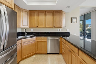 Serene Lakefront Views through 9-ft walls of windows. Lots of on Desert Island Golf and Country Club in California - for sale on GolfHomes.com, golf home, golf lot