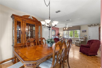 PRICE IMPROVEMENT ON THIS UNIQUE MAPLE MODEL, being offered as on The Links of Spruce Creek in Florida - for sale on GolfHomes.com, golf home, golf lot