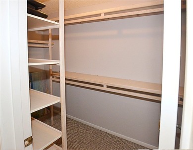 Remodeled end unit w/ serene golf/lake views, tons of natural on The American Golf Club in Florida - for sale on GolfHomes.com, golf home, golf lot