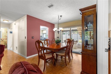 PRICE IMPROVEMENT ON THIS UNIQUE MAPLE MODEL, being offered as on The Links of Spruce Creek in Florida - for sale on GolfHomes.com, golf home, golf lot