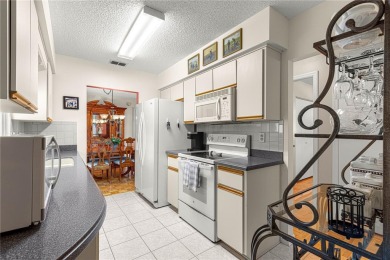 PRICE IMPROVEMENT ON THIS UNIQUE MAPLE MODEL, being offered as on The Links of Spruce Creek in Florida - for sale on GolfHomes.com, golf home, golf lot