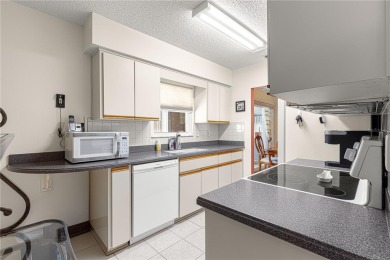 PRICE IMPROVEMENT ON THIS UNIQUE MAPLE MODEL, being offered as on The Links of Spruce Creek in Florida - for sale on GolfHomes.com, golf home, golf lot