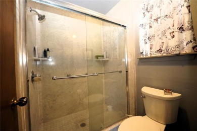 Incredible opportunity in a prime location! Nestled in one of on Golf Club At Surrey Hills in Oklahoma - for sale on GolfHomes.com, golf home, golf lot