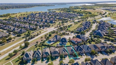 Welcome to resort-style living in The Tribute, a premier on The Tribute At the Colony in Texas - for sale on GolfHomes.com, golf home, golf lot