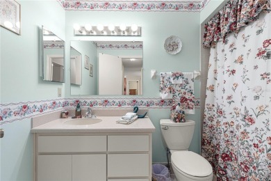 PRICE IMPROVEMENT ON THIS UNIQUE MAPLE MODEL, being offered as on The Links of Spruce Creek in Florida - for sale on GolfHomes.com, golf home, golf lot