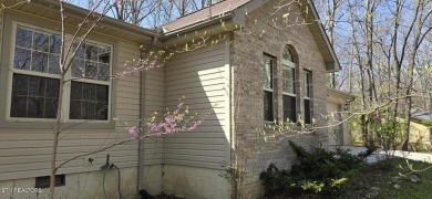 Nice three bedroom, two bath home with two car garage on Druid Hills Golf Club in Tennessee - for sale on GolfHomes.com, golf home, golf lot