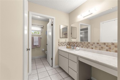 PRICE IMPROVEMENT ON THIS UNIQUE MAPLE MODEL, being offered as on The Links of Spruce Creek in Florida - for sale on GolfHomes.com, golf home, golf lot