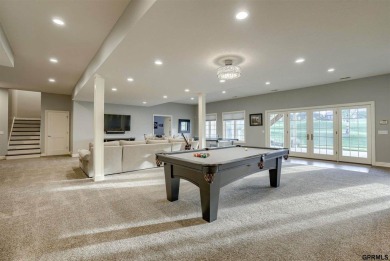 Experience true luxury in this exceptional home backing to on The Champions Club in Nebraska - for sale on GolfHomes.com, golf home, golf lot