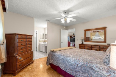 PRICE IMPROVEMENT ON THIS UNIQUE MAPLE MODEL, being offered as on The Links of Spruce Creek in Florida - for sale on GolfHomes.com, golf home, golf lot