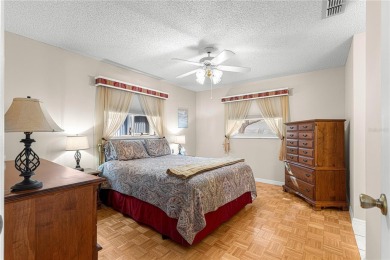 PRICE IMPROVEMENT ON THIS UNIQUE MAPLE MODEL, being offered as on The Links of Spruce Creek in Florida - for sale on GolfHomes.com, golf home, golf lot