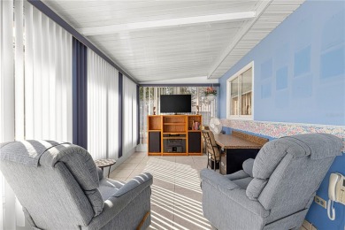 PRICE IMPROVEMENT ON THIS UNIQUE MAPLE MODEL, being offered as on The Links of Spruce Creek in Florida - for sale on GolfHomes.com, golf home, golf lot