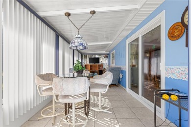 PRICE IMPROVEMENT ON THIS UNIQUE MAPLE MODEL, being offered as on The Links of Spruce Creek in Florida - for sale on GolfHomes.com, golf home, golf lot