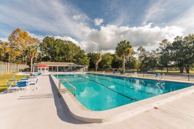 Welcome to the only two-story home in the gated Creekside Villas on Turkey Creek Golf and Country Club in Florida - for sale on GolfHomes.com, golf home, golf lot