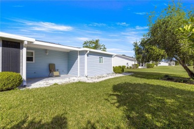 PRICE IMPROVEMENT ON THIS UNIQUE MAPLE MODEL, being offered as on The Links of Spruce Creek in Florida - for sale on GolfHomes.com, golf home, golf lot
