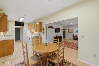 This charming three-bedroom, two-bath condo is tucked away in on Rock Springs Golf Course in Tennessee - for sale on GolfHomes.com, golf home, golf lot