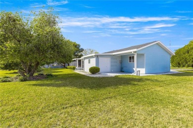 PRICE IMPROVEMENT ON THIS UNIQUE MAPLE MODEL, being offered as on The Links of Spruce Creek in Florida - for sale on GolfHomes.com, golf home, golf lot