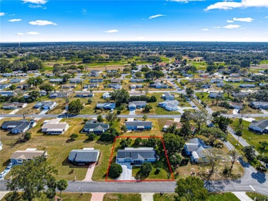 PRICE IMPROVEMENT ON THIS UNIQUE MAPLE MODEL, being offered as on The Links of Spruce Creek in Florida - for sale on GolfHomes.com, golf home, golf lot