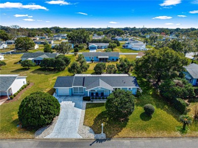 PRICE IMPROVEMENT ON THIS UNIQUE MAPLE MODEL, being offered as on The Links of Spruce Creek in Florida - for sale on GolfHomes.com, golf home, golf lot