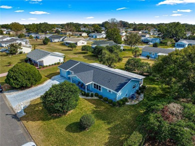 PRICE IMPROVEMENT ON THIS UNIQUE MAPLE MODEL, being offered as on The Links of Spruce Creek in Florida - for sale on GolfHomes.com, golf home, golf lot