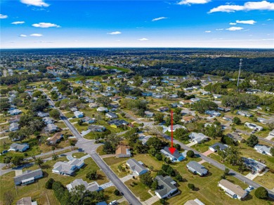 PRICE IMPROVEMENT ON THIS UNIQUE MAPLE MODEL, being offered as on The Links of Spruce Creek in Florida - for sale on GolfHomes.com, golf home, golf lot