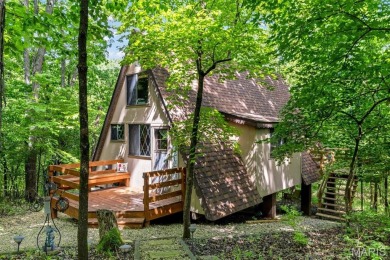 Welcome to your private woodland retreat at Innsbrook! Tucked on Innsbrook Resort Golf Course in Missouri - for sale on GolfHomes.com, golf home, golf lot