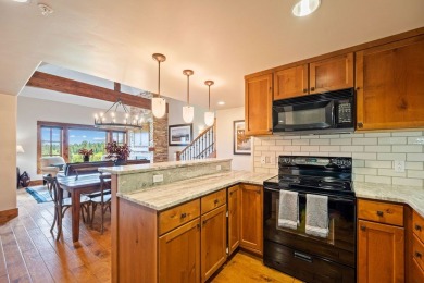 PENTHOUSE ON THE GOLF COURSE WITH PANORAMIC LAKE & MOUNTAIN on Osprey Meadows at Tamarack Resort in Idaho - for sale on GolfHomes.com, golf home, golf lot