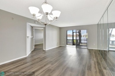 Enjoy the spectacular LAKE view from this beautiful and LARGE on Flamingo Lakes Country Club in Florida - for sale on GolfHomes.com, golf home, golf lot