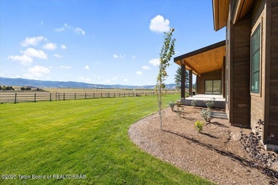 Discover elevated mountain living in this brand-new custom home on Teton Reserve in Idaho - for sale on GolfHomes.com, golf home, golf lot