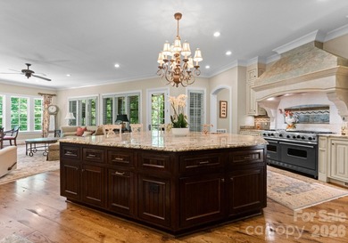 This custom estate embodies luxury, privacy, and timeless on The Palisades Country Club in North Carolina - for sale on GolfHomes.com, golf home, golf lot