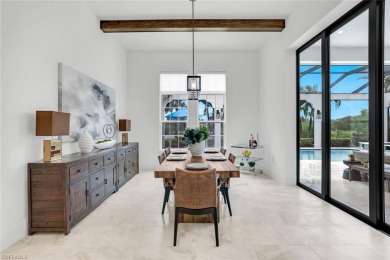 A RARE riverfront GEM with tranquil preserve, sunset views and on The Golf Club At Fiddlers Creek in Florida - for sale on GolfHomes.com, golf home, golf lot