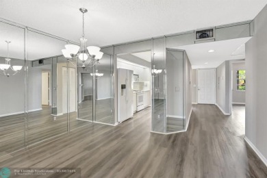 Enjoy the spectacular LAKE view from this beautiful and LARGE on Flamingo Lakes Country Club in Florida - for sale on GolfHomes.com, golf home, golf lot