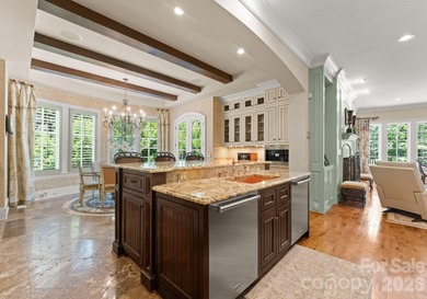 This custom estate embodies luxury, privacy, and timeless on The Palisades Country Club in North Carolina - for sale on GolfHomes.com, golf home, golf lot