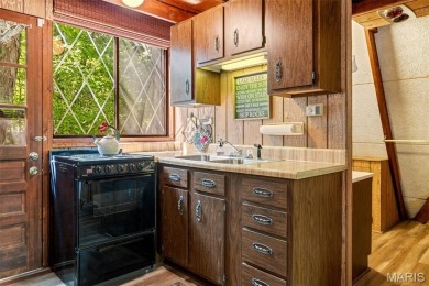 Welcome to your private woodland retreat at Innsbrook! Tucked on Innsbrook Resort Golf Course in Missouri - for sale on GolfHomes.com, golf home, golf lot