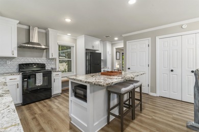 Lake DeSoto lakefront home in America's Largest gated community on DeSoto Golf Course in Arkansas - for sale on GolfHomes.com, golf home, golf lot