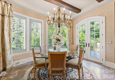 This custom estate embodies luxury, privacy, and timeless on The Palisades Country Club in North Carolina - for sale on GolfHomes.com, golf home, golf lot