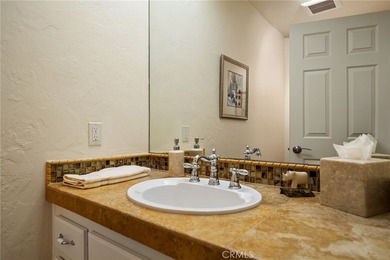 Welcome to a truly exceptional residence in The Lakes Country on The Lakes Country Club in California - for sale on GolfHomes.com, golf home, golf lot