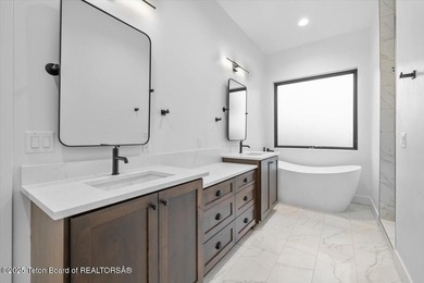 Discover elevated mountain living in this brand-new custom home on Teton Reserve in Idaho - for sale on GolfHomes.com, golf home, golf lot