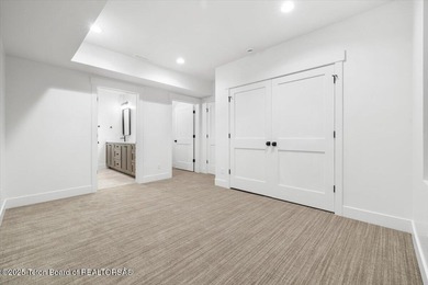 Discover elevated mountain living in this brand-new custom home on Teton Reserve in Idaho - for sale on GolfHomes.com, golf home, golf lot