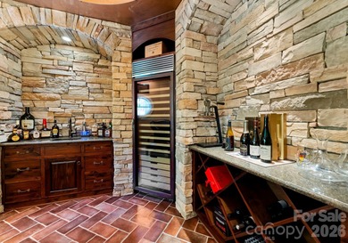 This custom estate embodies luxury, privacy, and timeless on The Palisades Country Club in North Carolina - for sale on GolfHomes.com, golf home, golf lot